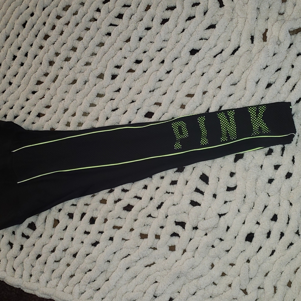 PINK black leggings with neon yellow   and black mesh detail.